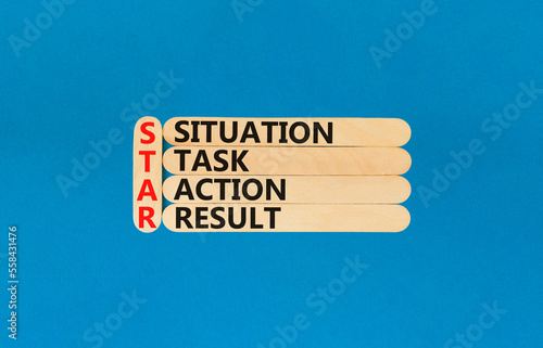 STAR situation task action result symbol. Concept words STAR situation task action result on wooden stick on beautiful blue background. Business STAR situation task action result concept. Copy space.
