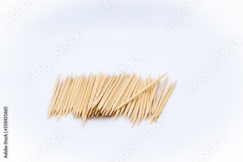 Toothpicks in the center of the image on white background