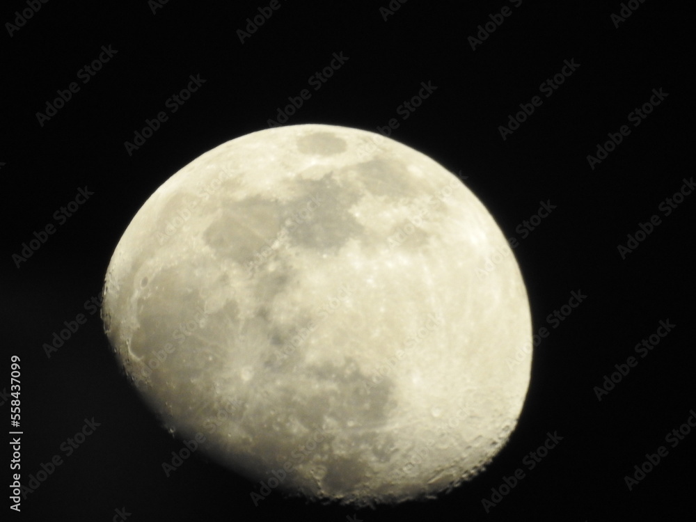 Telescopic view of a full moon. Full moon shot showing details of the moon s surface. Telescopic view of a full moon. Full moon shot showing details of the moon s surface.