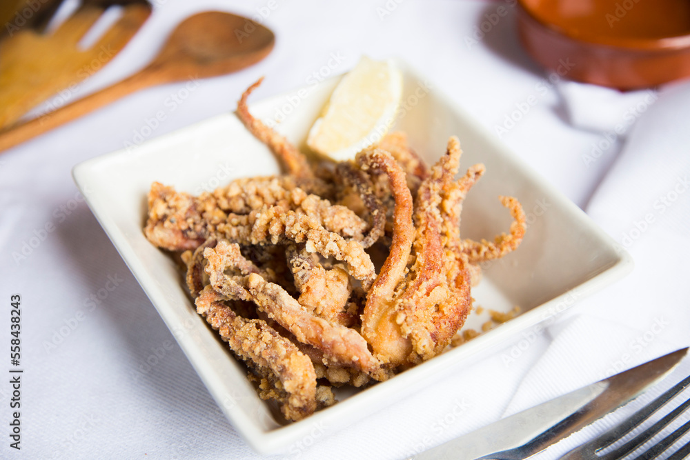 Chipirones Fritos. Deep fried Baby Squid. Traditional Spanish tapa recipe. Chipirones Fritos. Deep fried Baby Squid. Traditional Spanish tapa recipe.