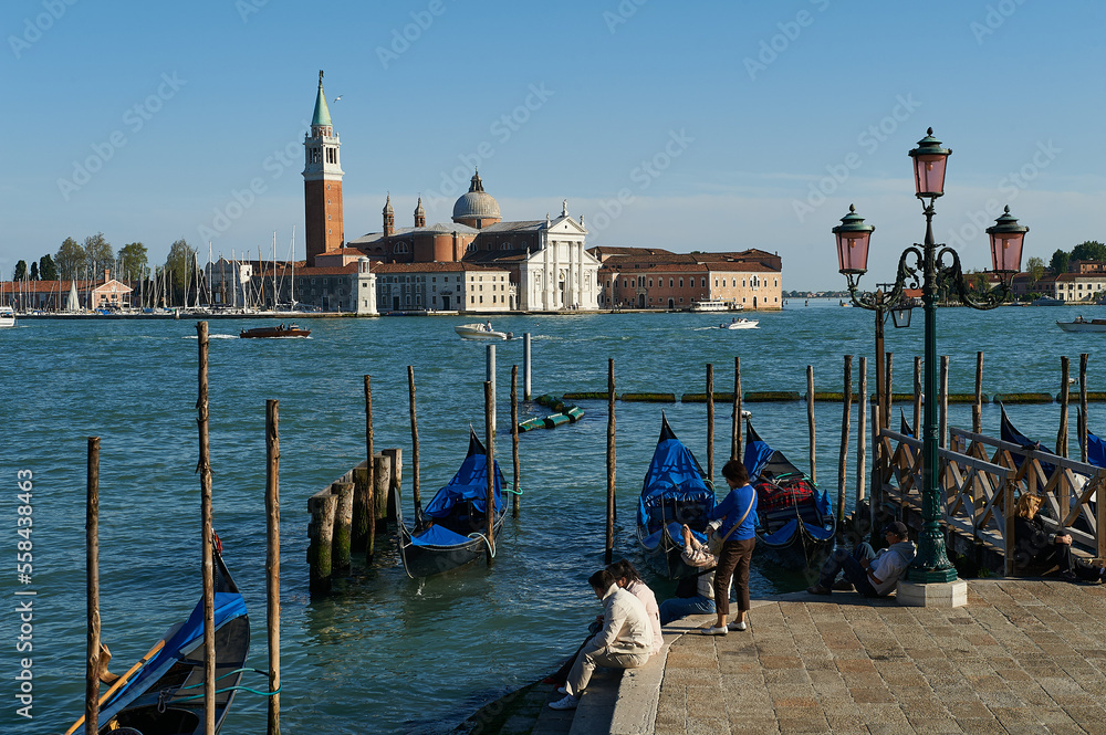 View of San Giorgio Maggiore from the landing stage for Gondolas in front of the Palazzo Ducale in Venice, Italy