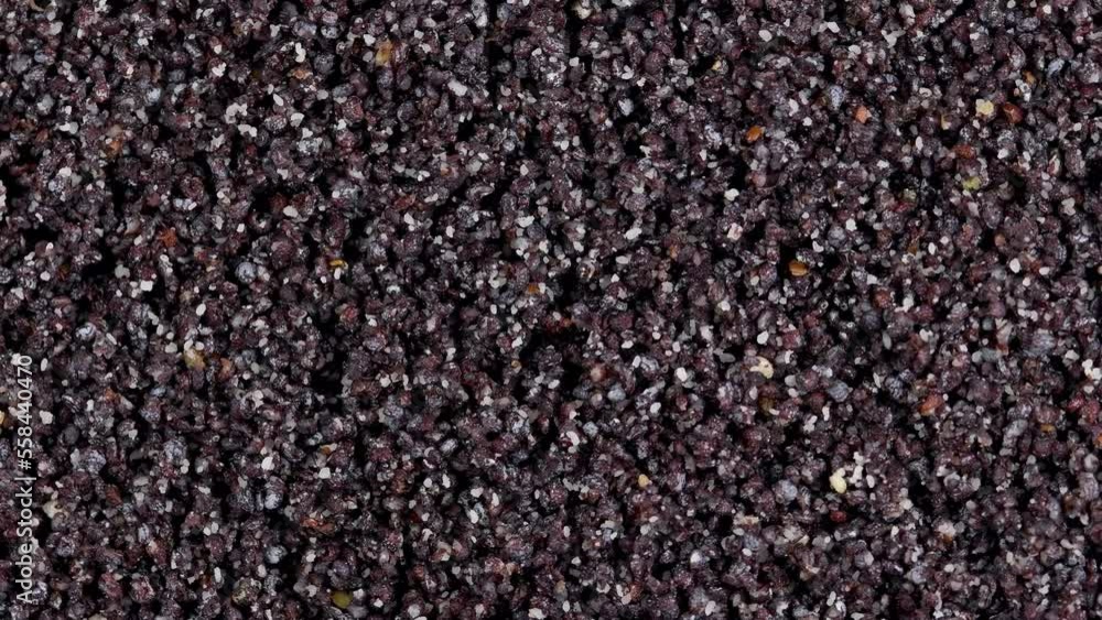 poppy seeds for bakery on a turn table in a closeup poppy seeds for bakery on a turn table in a closeup