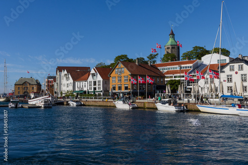 Beuatiful houses and church at the harbor of the Norwegian city of Stavanger.