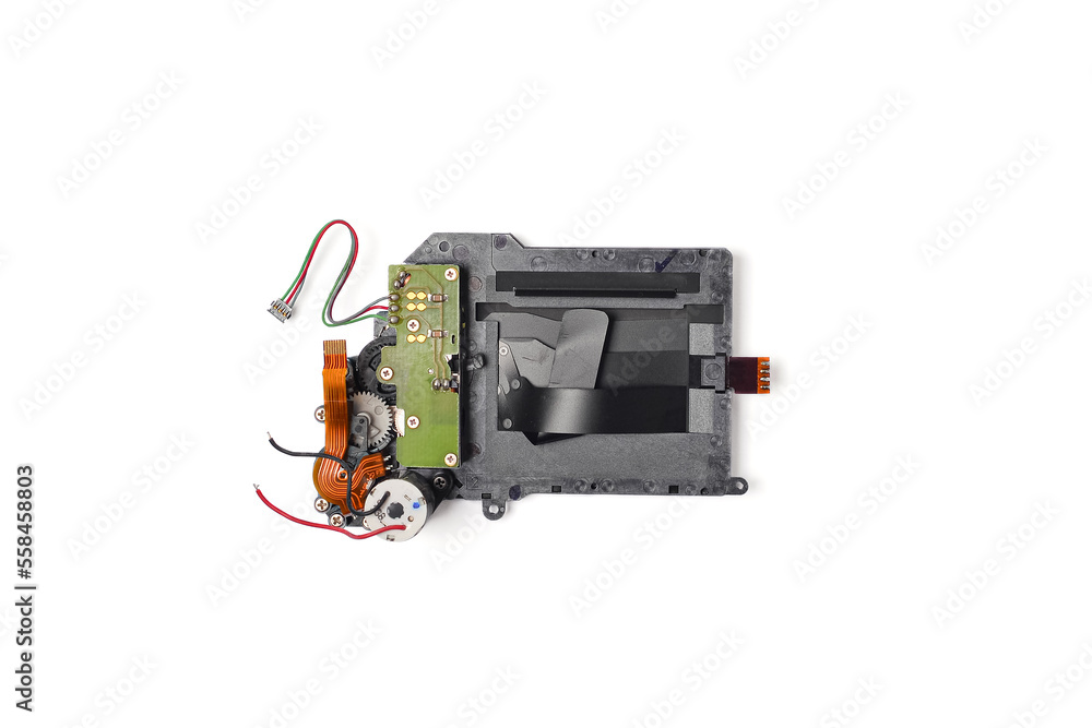 Old broken shutter of digital camera isolated on a white background. Old broken shutter of digital camera isolated on a white background.