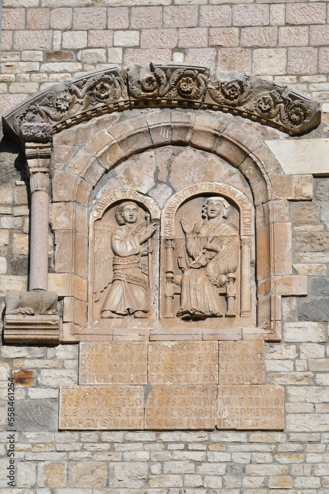 Religious medieval sculptures on the wall of an ancient cathedral in Rapolla, a small town in southern Italy.