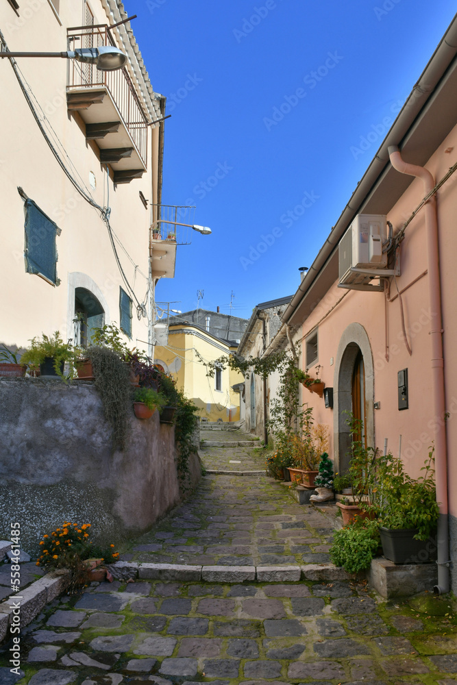 A narrow street among the old houses of Rapolla, a village in the province of Potenza in Italy.
