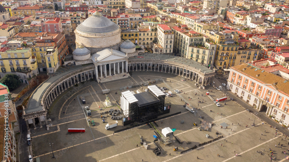 Fototapeta premium Aerial view of Piazza del Plebiscito, a large public square in the historic center of Naples, Italy. It's bounded by San Francesco di Paola' s church and its hallmark twin colonnades.