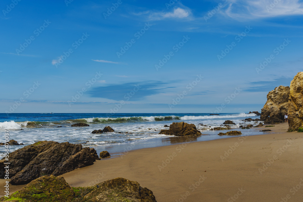 El Matador Beach along the East Pacific Coast Highway in Malibu California. The beach is a collection cliff-foot beaches and bluff top view of the eroding formations, sea stacks, caves and arches. 