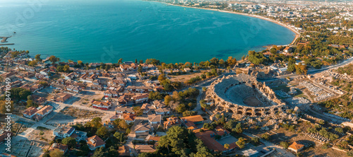 Fototapeta Naklejka Na Ścianę i Meble -  The Ancient City of Side. Port. Peninsula. Turkey. Manavgat. Antalya. The largest amphitheater in Turkey. The main street of the ancient city. Mediterranean Sea. View from above