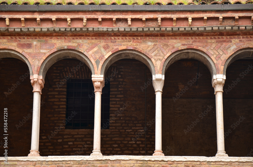 Detail of arches in building in Bologna