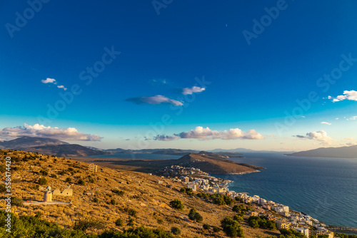 Beautiful view from Lekuresi Castle (Saranda, Albania) to Ionian sea, saranda town and greek island Corfu, Greece in the background photo