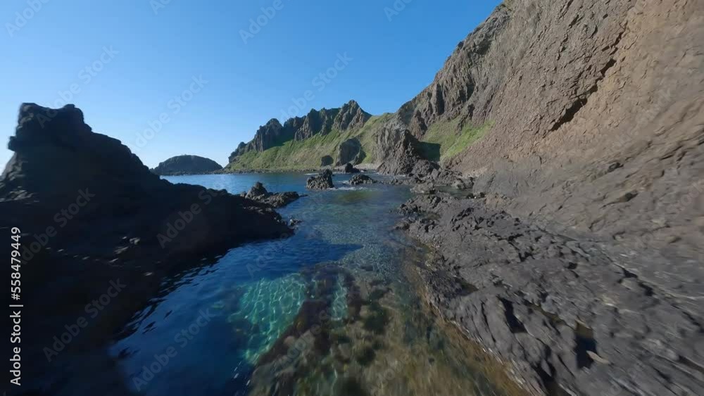 Birdseye view of mountain cliff edge and sea i Rebun Island Japan Birdseye view of mountain cliff edge and sea i Rebun Island Japan
