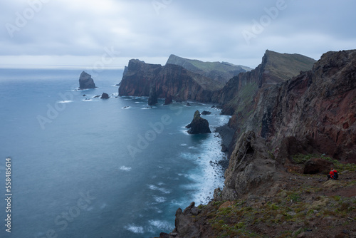 A cloudy morning on the Madeiran coast at Ponta de Sao Lourenco with a beautiful view of the cliffs of red volcanic rock. Great long exposure.