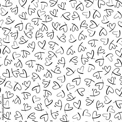 Seamless monochrome pattern with small hearts. Vector repeating texture. Repeatable backdrop with hand drawn black tiny hearts. © ozzichka