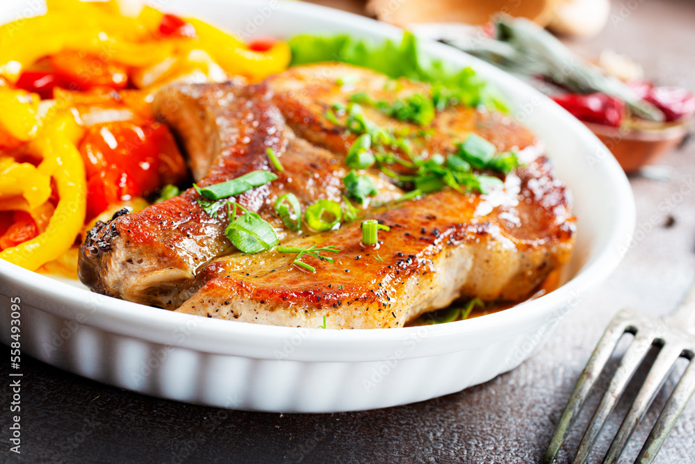 Grilled beef steak with rosemary in white plate Grilled beef steak with rosemary in white plate