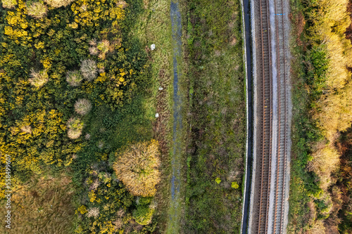 Top down view on a railway in a country side. Transportation industry. Nobody.