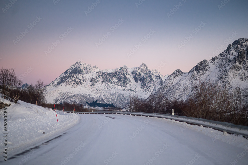 Atlantic road. Norway Lofoten islands, Norway. Nothen light, mountains and frozen ocean. Winter landscape at the night time. Norway travel - image. 