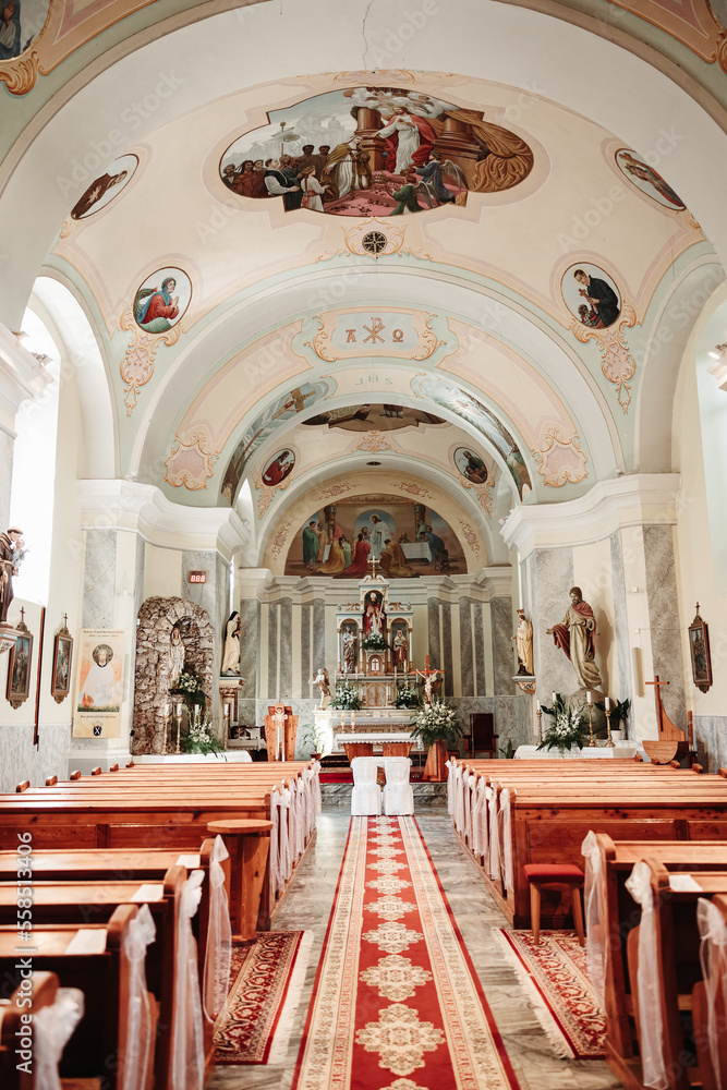 a beautiful ancient church that is decorated during the wedding day
