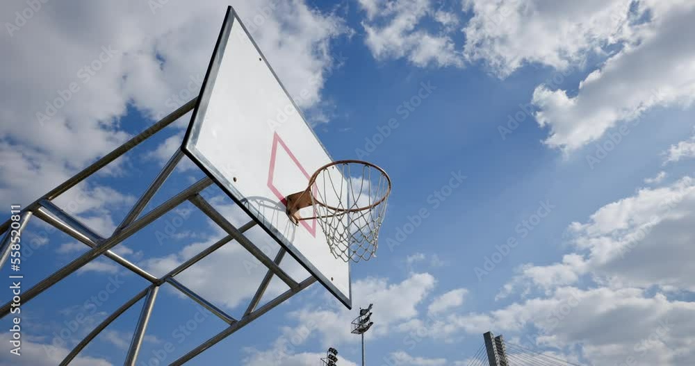 Basketball hoop over the blue sky Basketball hoop over the blue sky