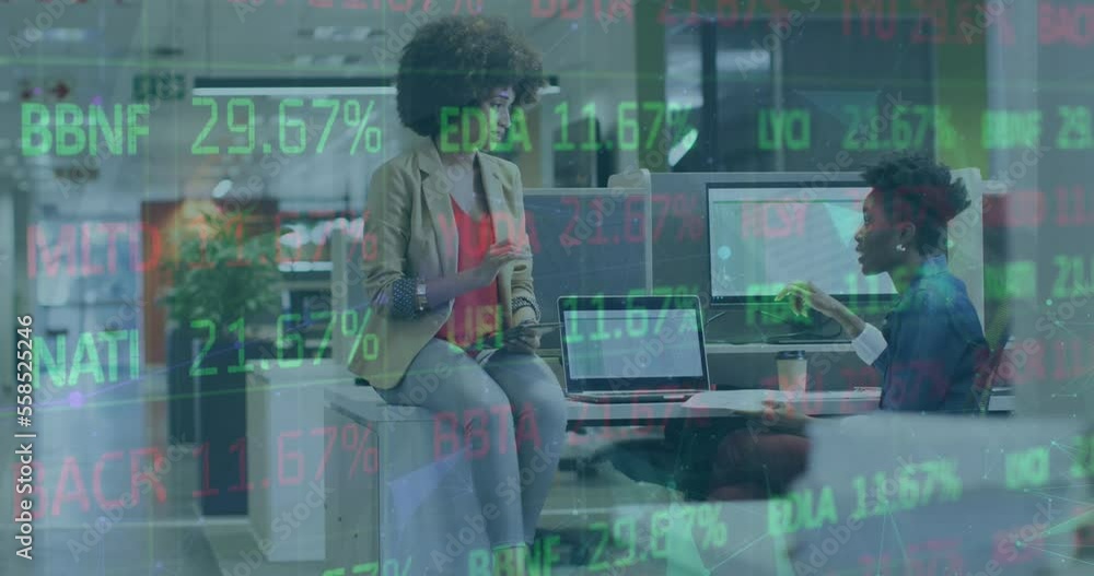 Animation of financial data processing over diverse business people in office Animation of financial data processing over diverse business people in office