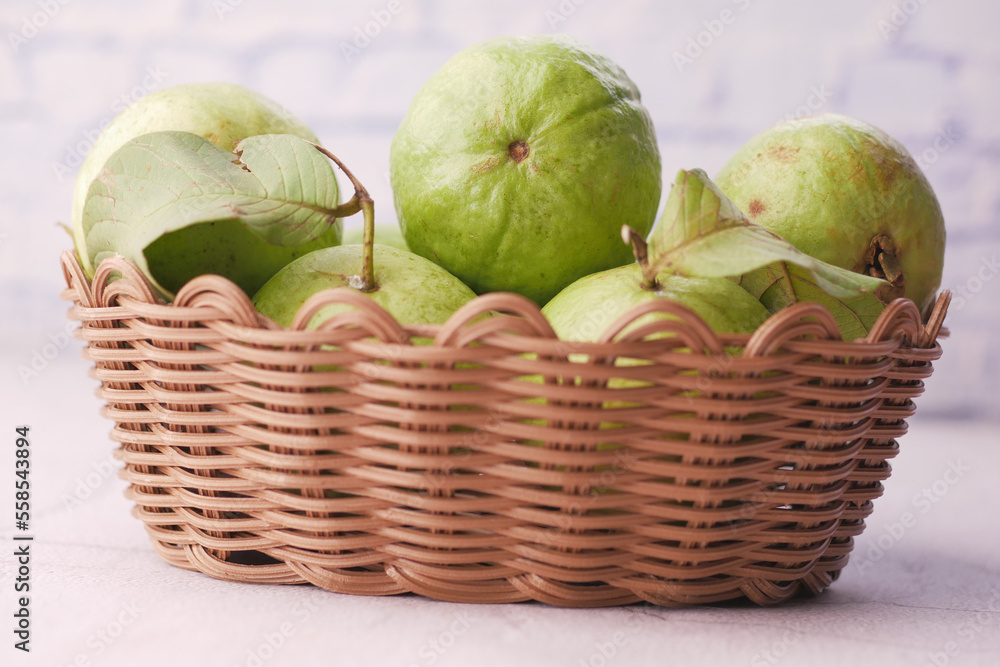 close up of slice of guava on table close up of slice of guava on table