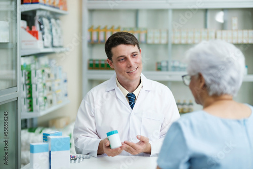 Pharmacist talking to a client about prescribed medications.