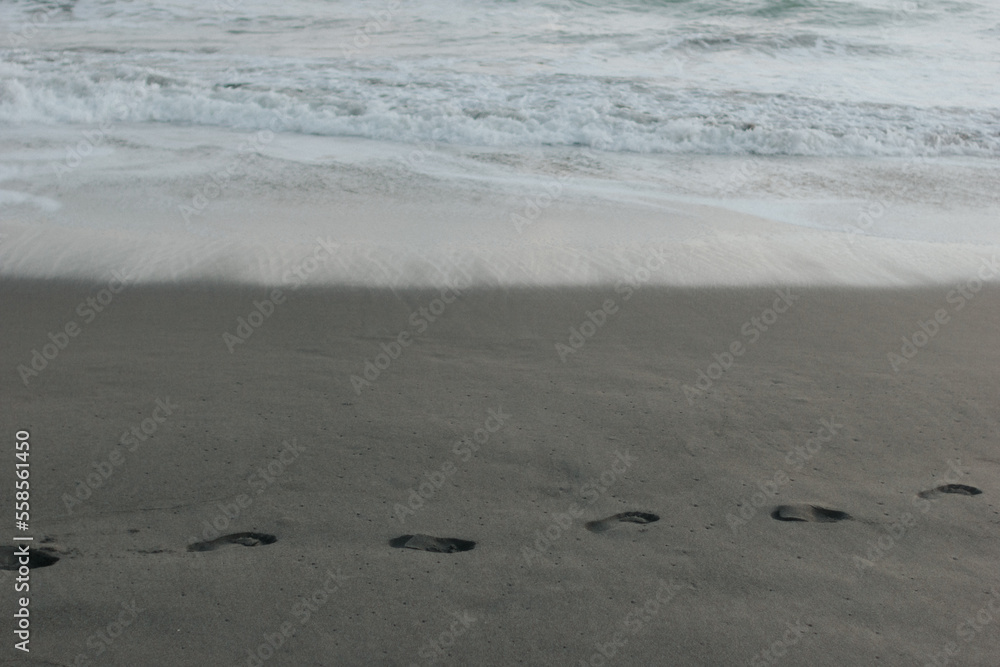 sand on natural beach with footprints for background sand on natural beach with footprints for background