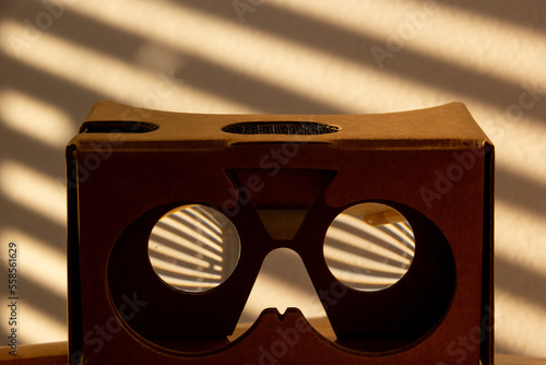 Immersive 3D Virtual Reality Goggles Frame Shadows Created By Window Blinds (ID: 558561629)