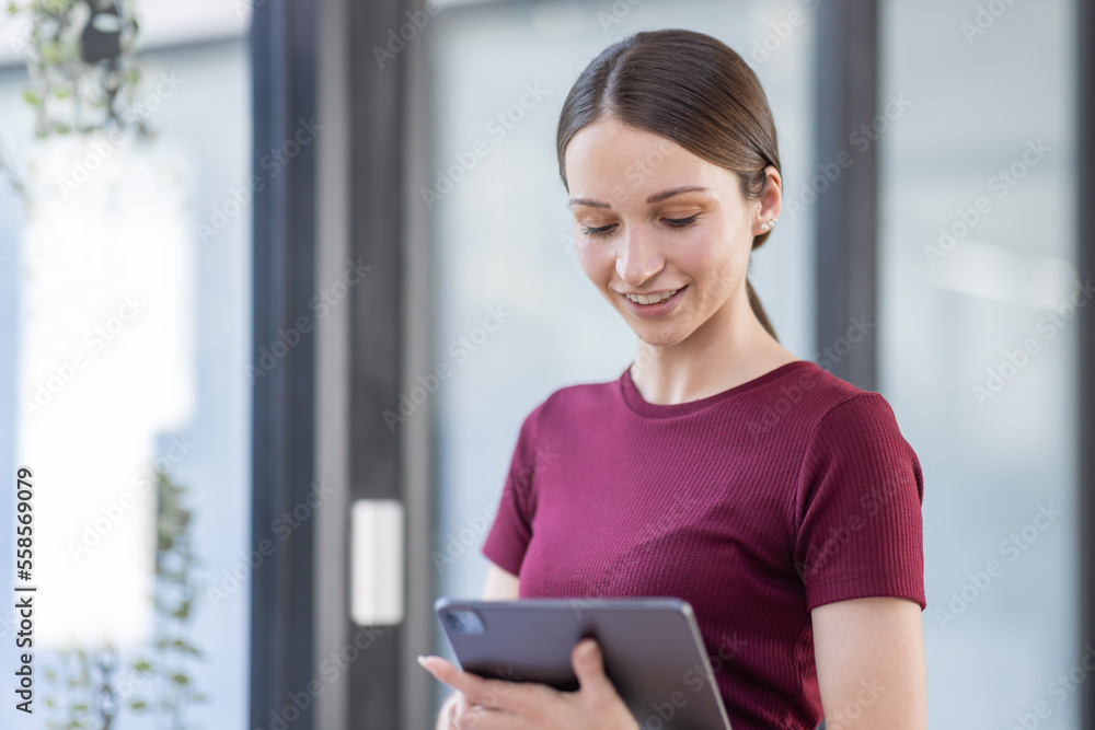 Portrait of Young canada american business woman in modern office,  financial report, business plan investment, finance analysis concept.