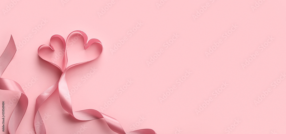 Hearts made of ribbon on pink background with space for text. Valentine's Day celebration