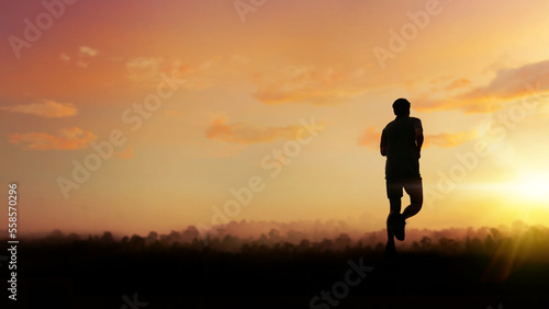 Fototapeta Naklejka Na Ścianę i Meble -  Silhouette of person running on road. Fitness runner outdoor with sunset background.