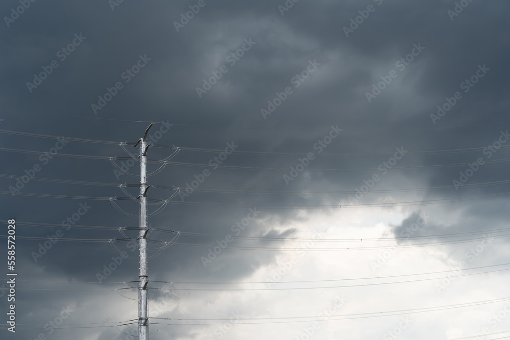 Scenic view of dark thunderstorm cloudscape over the high voltage tower. Scenic view of dark thunderstorm cloudscape over the high voltage tower.