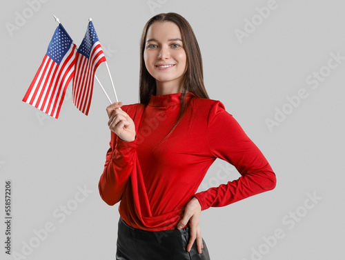 Young woman with USA flags ...