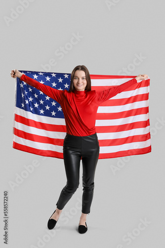 Young woman with USA flag o...