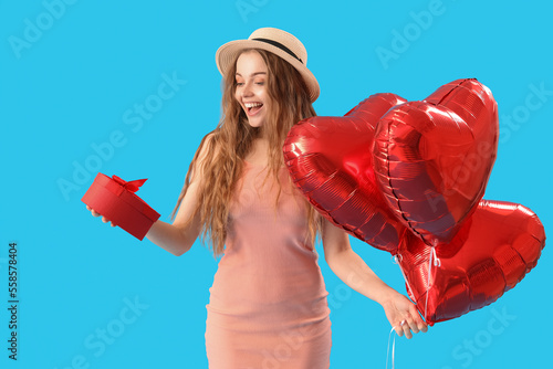 Happy young woman with hear...