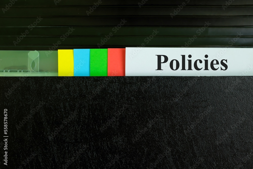 Policy Folder Layout Policies file record in black binder folder. Company and government ...