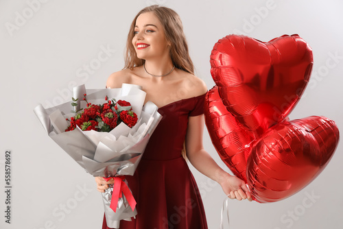 Happy young woman with hear...