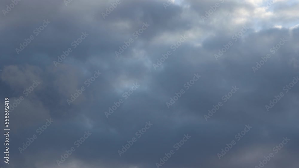 Smooth camera movement across the sky with dark, gloomy clouds, early sunset. Smooth camera movement across the sky with dark, gloomy clouds, early sunset.