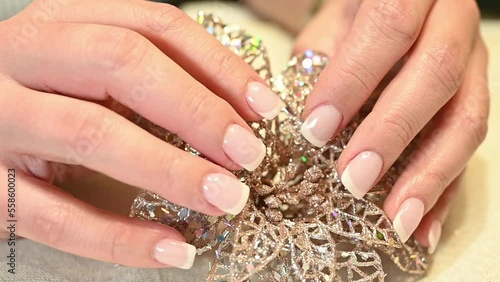 high-end perfectly manicured French nails photo