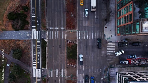 Aerial view above traffic on west streets of Tribeca, lower Manhattan, fall in NY - top down, drone shot photo