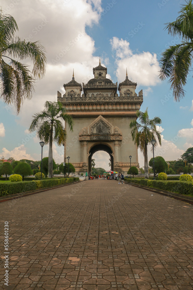 Wallpaper of Vientiane the golden city with sleeping buddha statue and golden temple. Popular for the giant gate. Asia