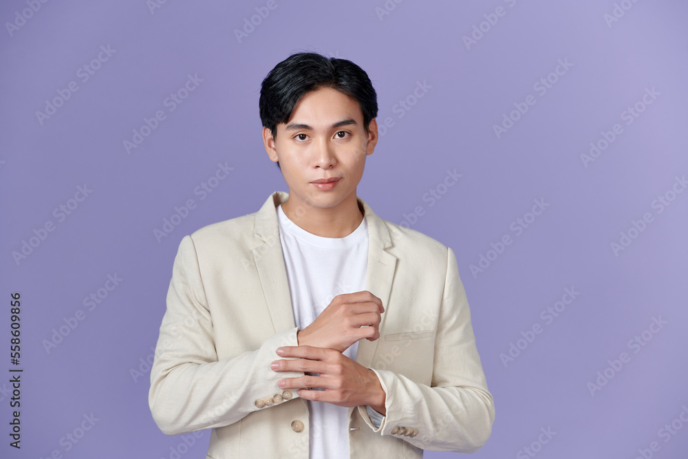 portrait of asian young smiling man standing on white background portrait of asian young smiling man standing on white background