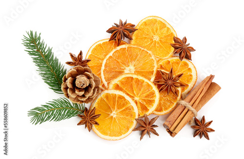 Dry orange slices, fir branches, cinnamon sticks and anise stars isolated on white, top view