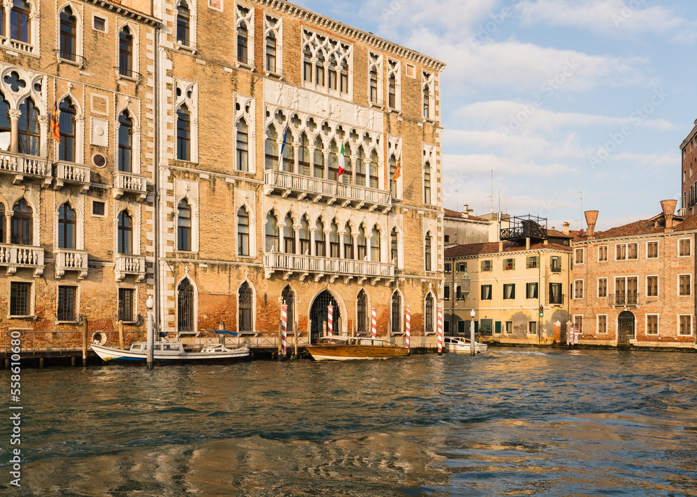 Charming architectural detail of buildings by the grand canal in Venice, Italy