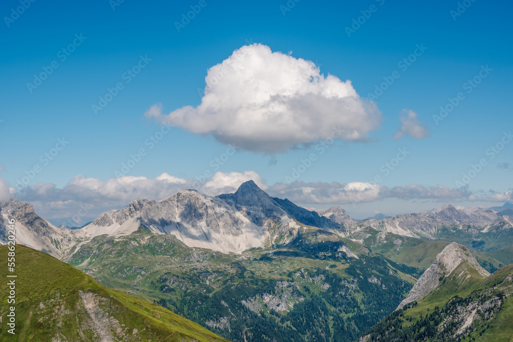 Panoramic view from Glingspitze (2433m) in the Austrian Alps, Mosermandl (2,680 m) peak in the middle. Summer mountain landscape.