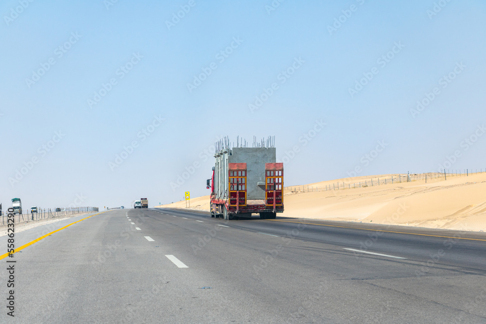 overloaded cargo truck on the road