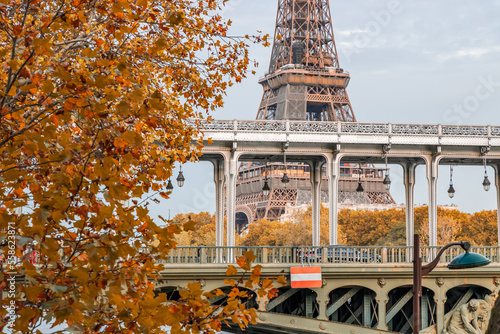 Bir Hakeim bridge an Eiffel Tower in Paris on an Autumn day in France photo