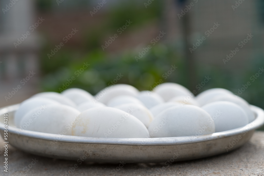 Duck eggs in the metal plate. Duck eggs in the metal plate.