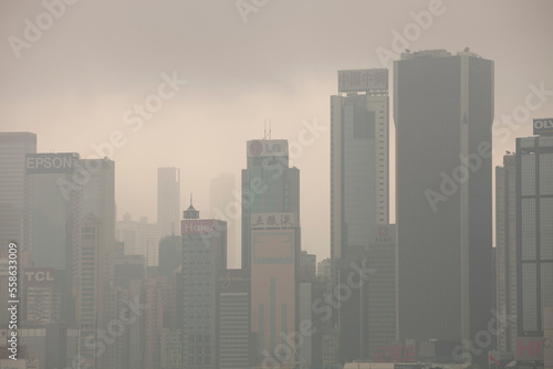 Hong Kong skyline and tower blocks in smoggy conditions, China. photo