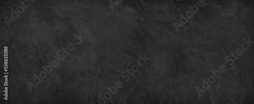 Dark concrete textured wall background,black grunge cement wall texture for interior design,copy space for add text.